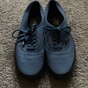 Blue canvas vans with black sole